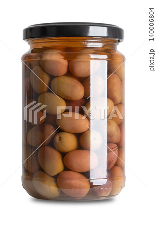 Nostraline olives, black olives with pits in a glass jar with screw cap. Whole, Italian table olives, with tapered shape and purple color, preserved in a brine of salt and vinegar. Front view. Photo Nostraline olives, black olives with pits in a glass jar with screw cap. Whole, Italian table olives, with tapered shape and purple color, preserved in a brine of salt and vinegar. Front view. Photo 140006804