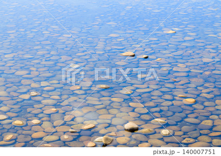 pond water pool design perspective ground surface with stones background tranquil concept 140007751
