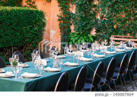 glass dishes served table outside garden yard without people here 140007804