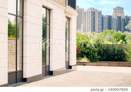 pedestrian space building yard paved floor patio porch with flora Asian huge city scape background 140007809