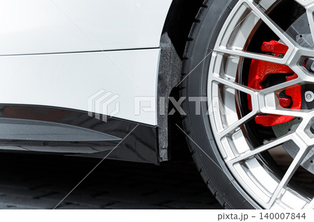 new car white frame bottom part with view of wheel tire circle shape background perspective empty copy space new car white frame bottom part with view of wheel tire circle shape background perspective empty copy space 140007844