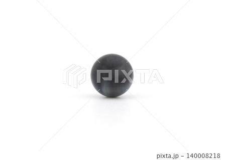Blue tiger eye stone stands out on a white background Blue tiger eye stone stands out on a white background 140008218