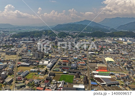 宮崎県延岡市の市街地と山並みを捉えた空撮写真 宮崎県延岡市の市街地と山並みを捉えた空撮写真 140009657