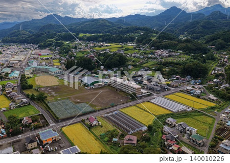 群馬県中之条町の田園集落と山並みを捉えた空撮写真 群馬県中之条町の田園集落と山並みを捉えた空撮写真 140010226