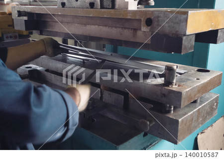 press mechanism at the factory, extrusion of parts. 140010587