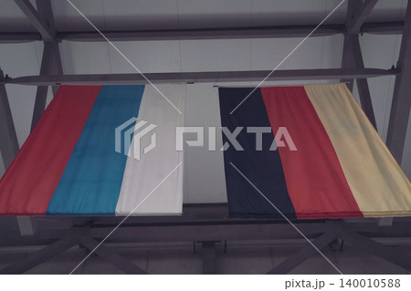 Russian and German flag nearby. 140010588