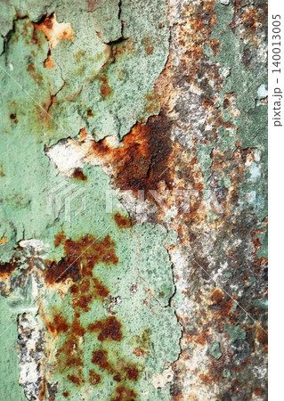 Green Paint Heavily Peeling Over Rich Rust on Metal, Multicolor Weathered Industrial Decay Texture Background Green Paint Heavily Peeling Over Rich Rust on Metal, Multicolor Weathered Industrial Decay Texture Background 140013005