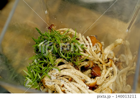 Mushrooms with seasoning and herbs in cup. Mushrooms with seasoning and herbs in cup. 140013211