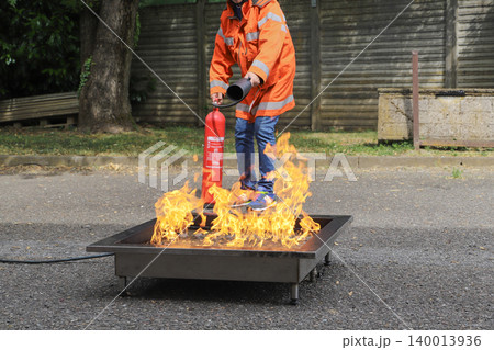 fire prevention. corporate safety - exercise during a firefighting course fire prevention. corporate safety - exercise during a firefighting course 140013936