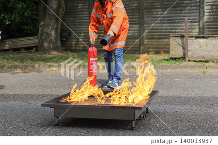 fire prevention. corporate safety - exercise during a firefighting course fire prevention. corporate safety - exercise during a firefighting course 140013937