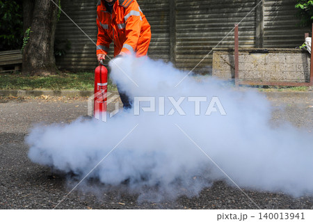fire prevention. corporate safety - exercise during a firefighting course 140013941