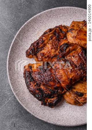 Chicken or turkey, poultry breast baked on the grill or barbecue. Grilled chicken Chicken or turkey, poultry breast baked on the grill or barbecue. Grilled chicken 140014900