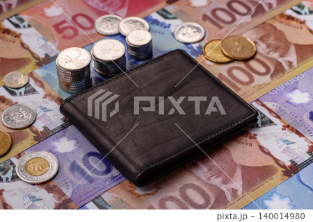 Canada, Canadian dollar, paper money and coins, financing exchange, trade. Canadian currency Canada, Canadian dollar, paper money and coins, financing exchange, trade. Canadian currency 140014980