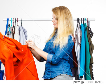 Happy woman clothes shopping Happy woman clothes shopping 140016915