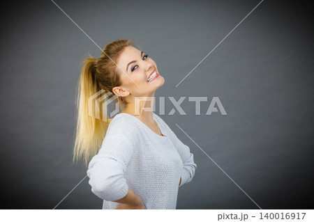 Happy positive smiling blonde woman Happy positive smiling blonde woman 140016917