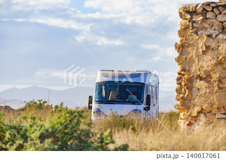 Camper vehicle camping in coastal landscape in Spain Camper vehicle camping in coastal landscape in Spain 140017061