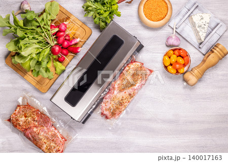 Vacuum sealing meat preparing for sous vide cooking Vacuum sealing meat preparing for sous vide cooking 140017163