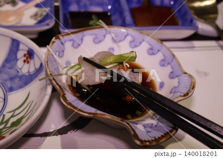 Japanese Sashimi with Soy Sauce and Green Onions Japanese Sashimi with Soy Sauce and Green Onions 140018201