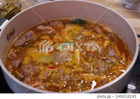 Steaming Pot of Spicy Beef Soup with Vegetables Steaming Pot of Spicy Beef Soup with Vegetables 140018245