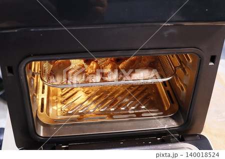 Oven with Roasting Chicken Wings 140018524
