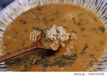 Rice and Leafy Greens Soup in Bowl Rice and Leafy Greens Soup in Bowl 140018599