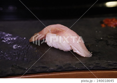 Fresh Sashimi Nigiri on Slate Plate Fresh Sashimi Nigiri on Slate Plate 140018645