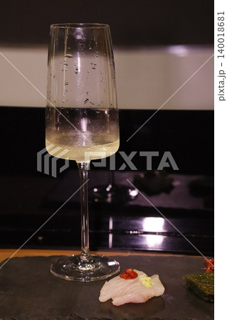 Wine Glass with Sashimi on Slate 140018681