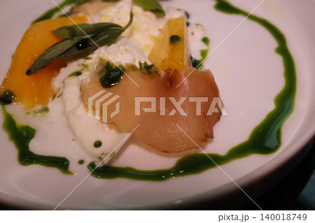 Elegant Fish Dish with Citrus and Herb Garnish 140018749