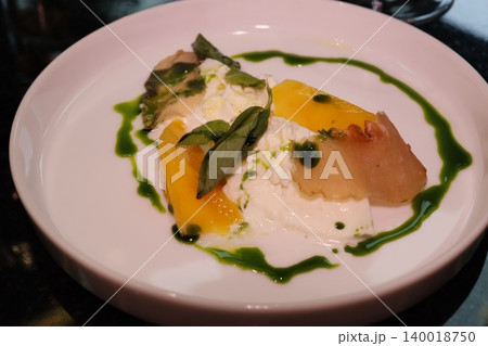 Elegant Plate of Artisanal Dish with Citrus and Basil Elegant Plate of Artisanal Dish with Citrus and Basil 140018750