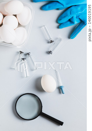 Protection against salmonella from chicken eggs, eggs on the table top and vertical view Protection against salmonella from chicken eggs, eggs on the table top and vertical view 140019195