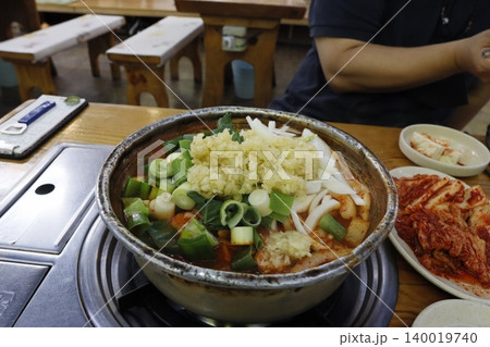 Korean Hot Pot with Kimchi and Garnishes Korean Hot Pot with Kimchi and Garnishes 140019740