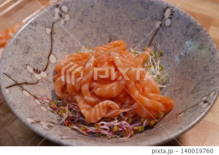 Fresh Salmon and Sprouts Bowl in Ceramic Dish Fresh Salmon and Sprouts Bowl in Ceramic Dish 140019760