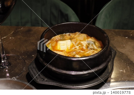 Stone Pot Soup with Vegetables and Cheese 140019778