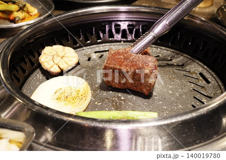 Grilled Steak and Vegetables on Korean BBQ Grill 140019780