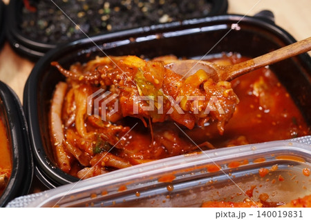 Spicy Korean Stew with Wooden Spoon Close-up 140019831