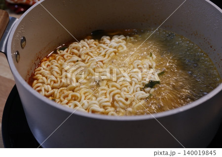 Boiling Instant Ramen Noodles in Pot Boiling Instant Ramen Noodles in Pot 140019845