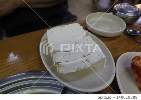 Tofu Slices on a Plate with Side Dishes Tofu Slices on a Plate with Side Dishes 140019889