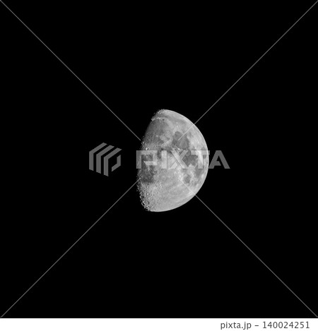 Beautiful half moon on the black sky background Beautiful half moon on the black sky background 140024251
