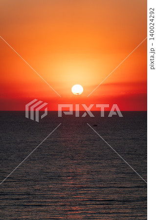 Beautiful red and orange sunrise over the sea. 140024292