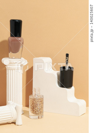 Nail polish on decorative pillars with a smooth background 140025607