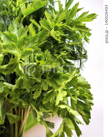 Fresh Parsley Leaves Bundle On Light Background 140026493