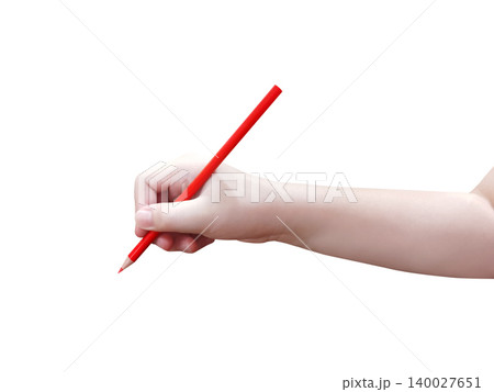 One hand is holding a red wooden pencil against a white background. 140027651