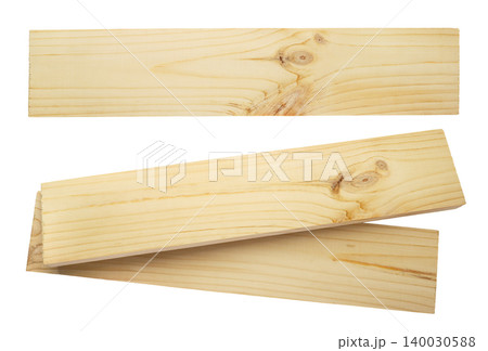 Set of wooden boards cut out on a white background. Edged boards top view Set of wooden boards cut out on a white background. Edged boards top view 140030588