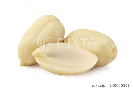 Peeled peanuts and half macro on a white. Isolated 140030591