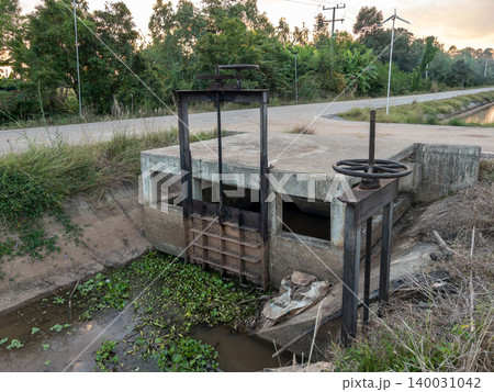 Irrigation Canal Sluice Gate in Rural Area Irrigation Canal Sluice Gate in Rural Area 140031042