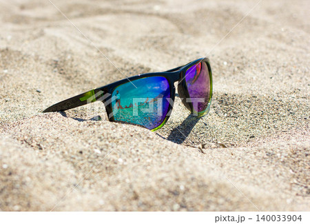 Sunglasses on Sand Beach Blue Mirror Lenses 140033904
