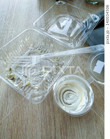 Fast food. Empty plastic plates from food on trays. Dirty dishes delicious food. 140034506