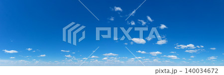 Blue Sky background with tiny Clouds. Panorama background 140034672