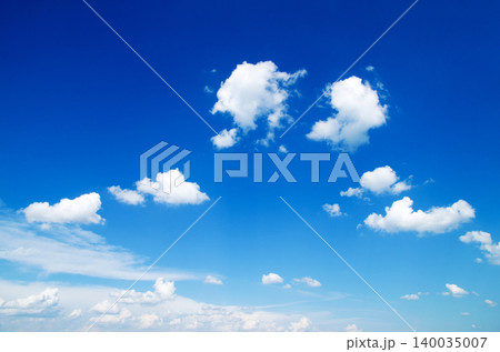 white fluffy clouds in the blue sky white fluffy clouds in the blue sky 140035007