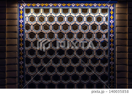 Ornate geometric wall tiling with hexagonal pattern Ornate geometric wall tiling with hexagonal pattern 140035858